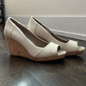 Toms canvas & cork wedges. Size 9.5. Tan color, very gently used. Comfortable!